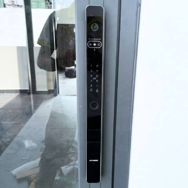 Installation images of the Hyundai HY-SLS005F premium smart lock for aluminum doors